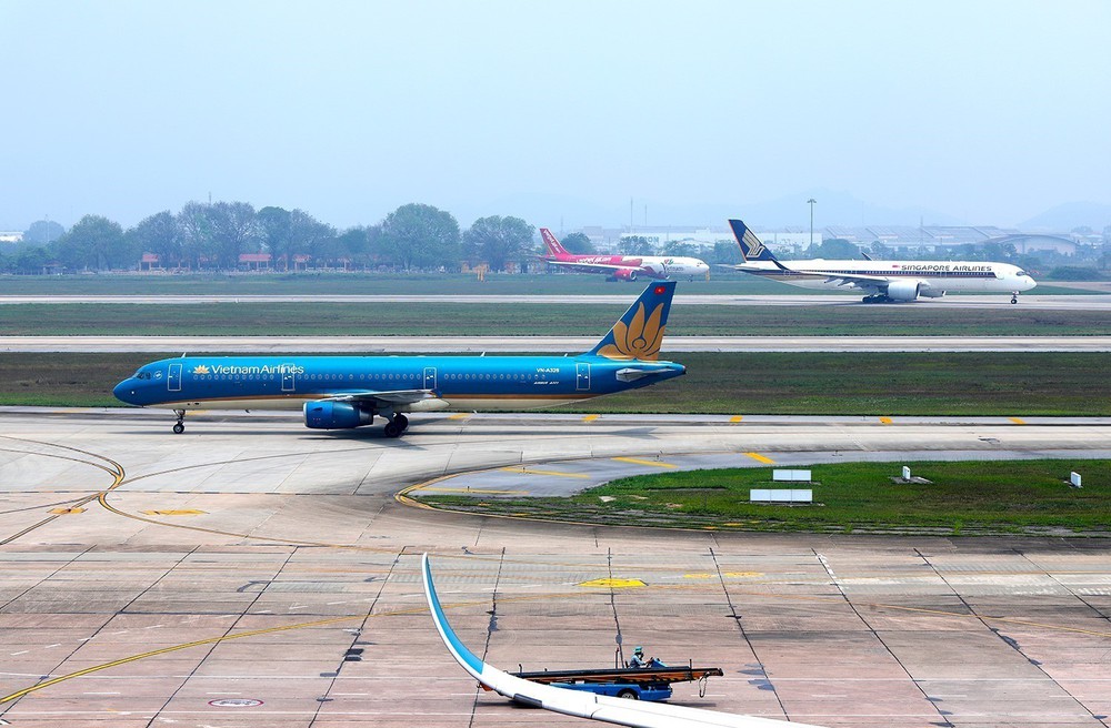 Vietnam Airlines báo lãi hơn 3.600 tỷ đồng nhờ khách quốc tế tăng mạnh, giá nhiên liệu giảm - Ảnh 2.