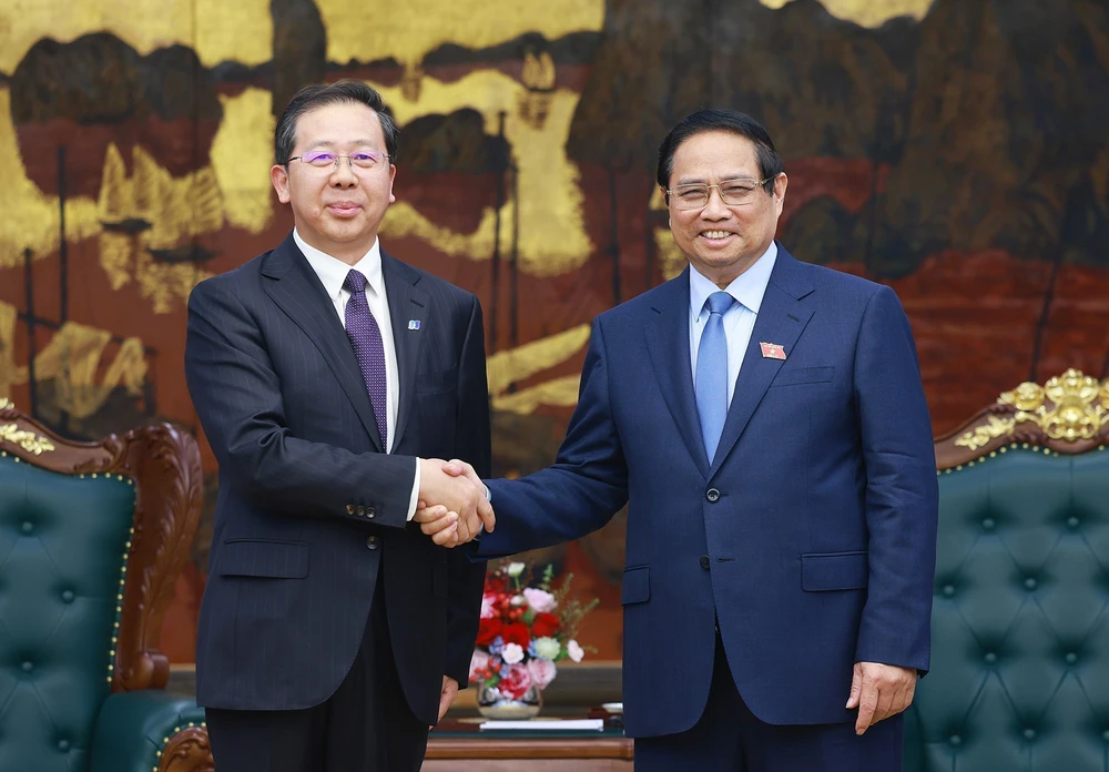 Thủ tướng Phạm Minh Chính hoan nghênh Tập đoàn Hoa Điện đầu tư dự án năng lượng xanh tại Việt Nam - Ảnh 1.