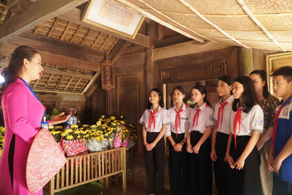 Nghĩa tình từ những mái nhà tranh trên quê hương Bác - Ảnh 1.