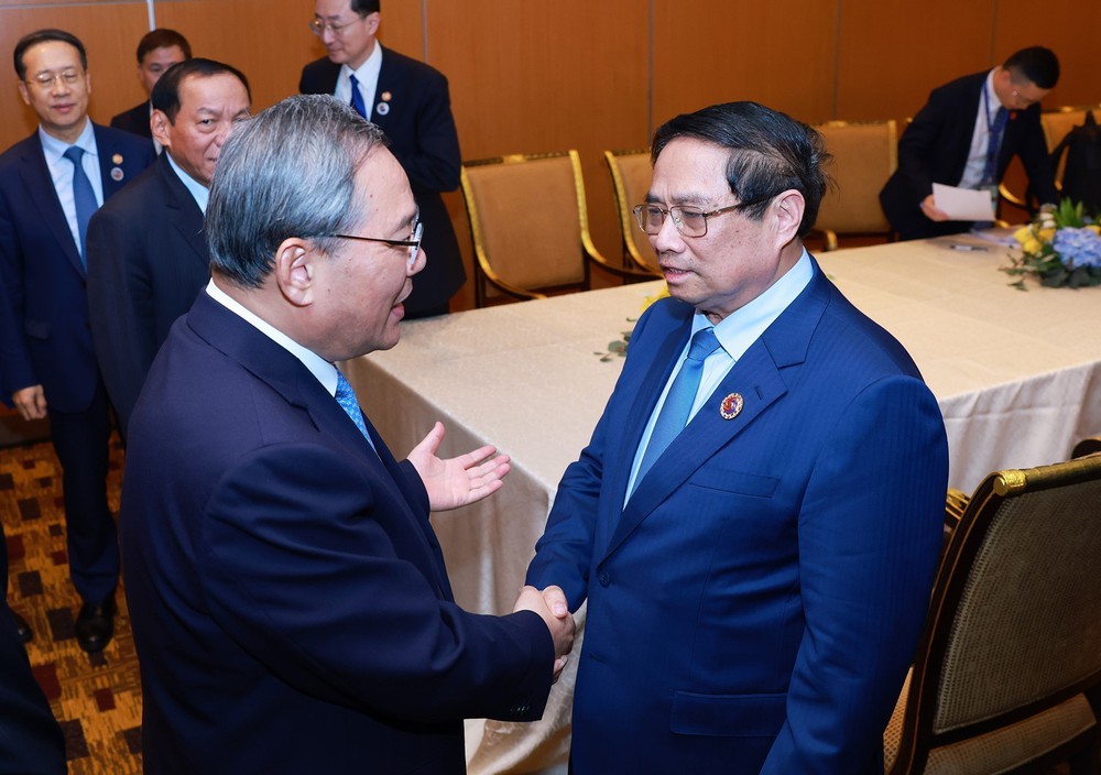 Hội nghị Cấp cao ASEAN: Thủ tướng Phạm Minh Chính hội đàm với Thủ tướng Trung Quốc Lý Cường - Ảnh 3.