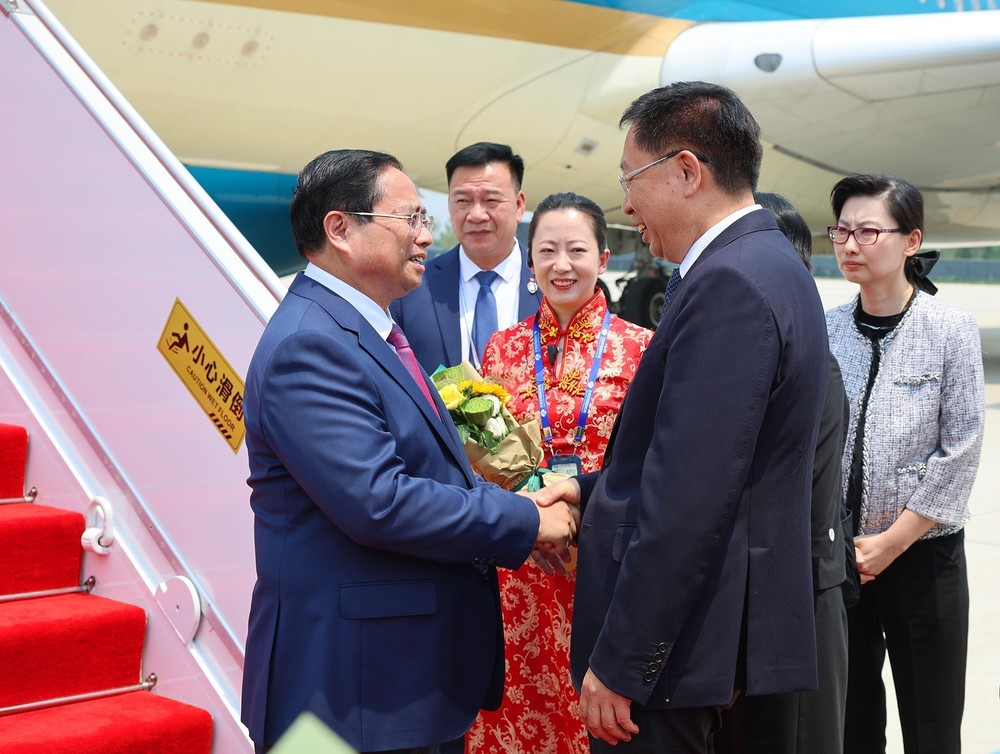 Thủ tướng Phạm Minh Chính tới Thiên Tân bắt đầu dự Diễn đàn Kinh tế thế giới và làm việc tại Trung Quốc - Ảnh 3.