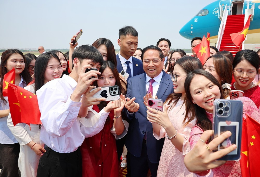 Thủ tướng Phạm Minh Chính tới Thiên Tân bắt đầu dự Diễn đàn Kinh tế thế giới và làm việc tại Trung Quốc - Ảnh 4.