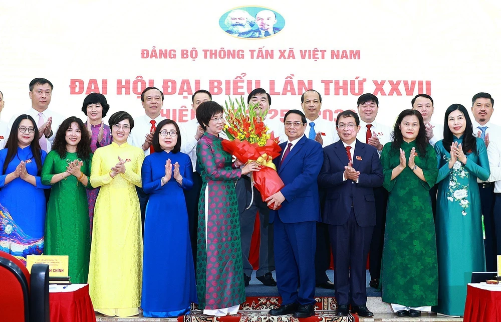 Đồng chí Vũ Việt Trang tái đắc cử Bí thư Đảng ủy TTXVN khóa 27, nhiệm kỳ 2025 - 2030 - Ảnh 2.