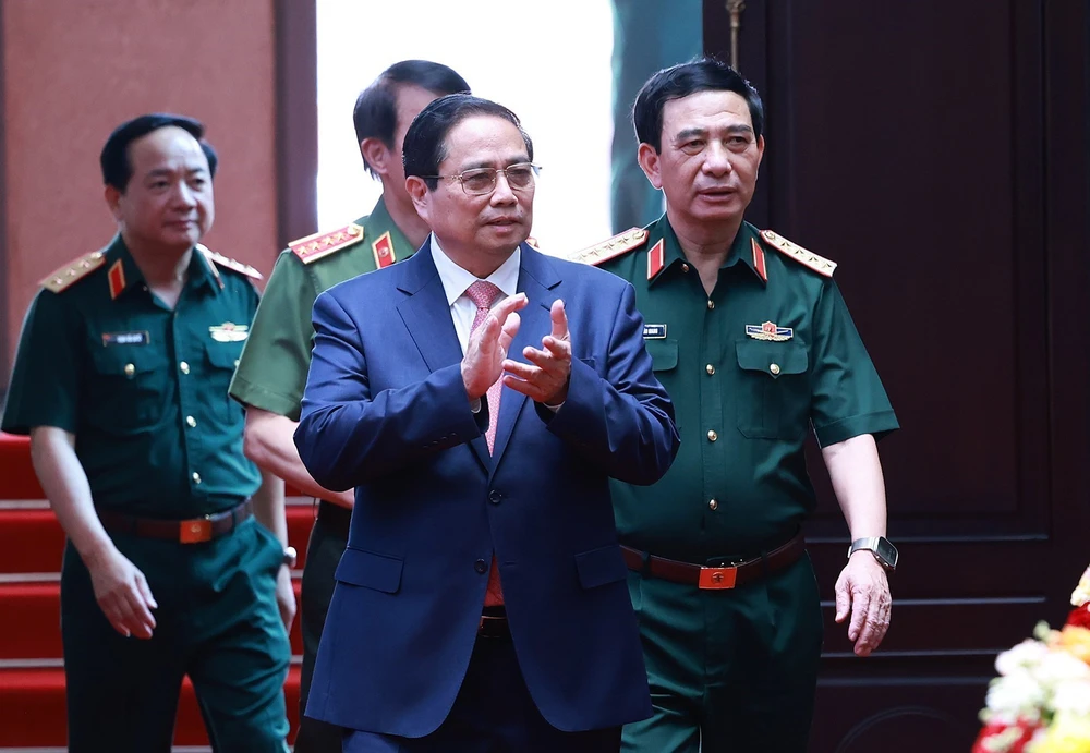 Thủ tướng Phạm Minh Chính: Quân đội tiếp tục thực hiện tốt vai trò nòng cốt trong xây dựng “thế trận lòng dân” - Ảnh 1.