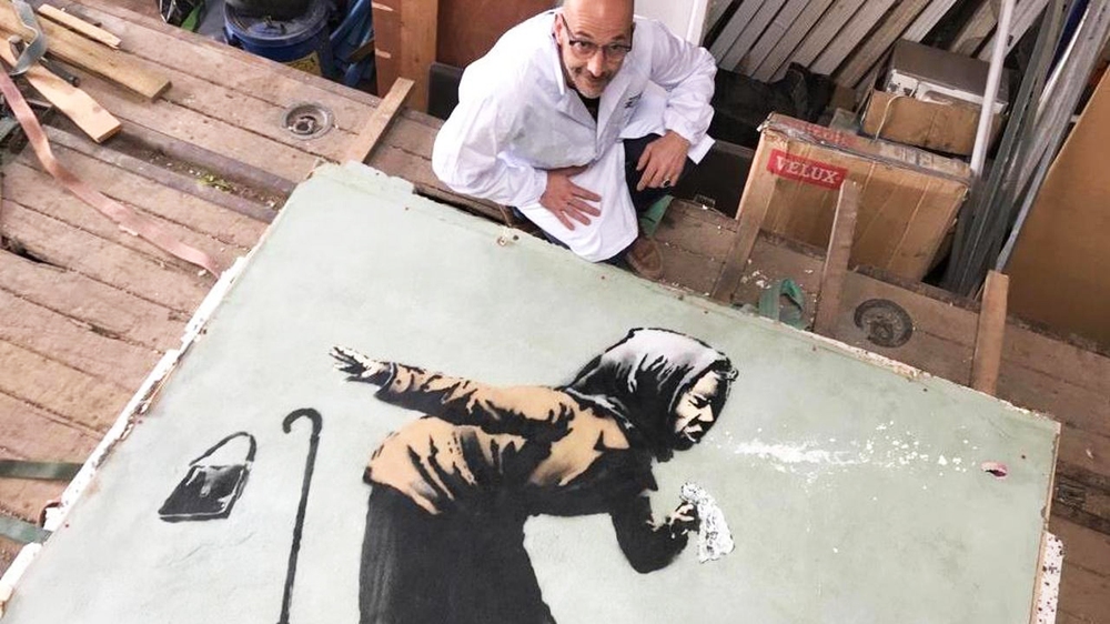 Venice phục chế tranh tường của Banksy - Ảnh 2.