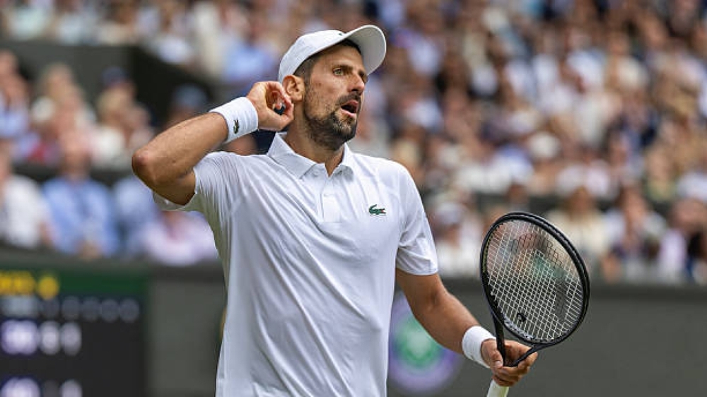 Ngược dòng bản lĩnh trước De Minaur, Djokovic giành vé vào tứ kết Wimbledon 2025 - Ảnh 2.
