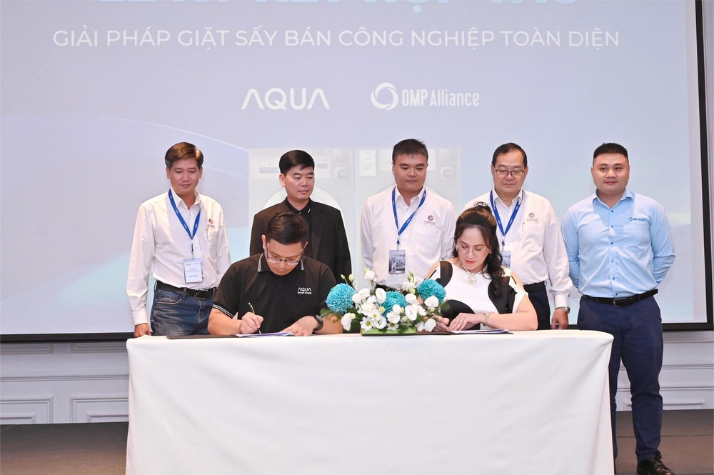 OMP Appliance và AQUA Việt Nam ký kết hợp tác chiến lược - Ảnh 1.