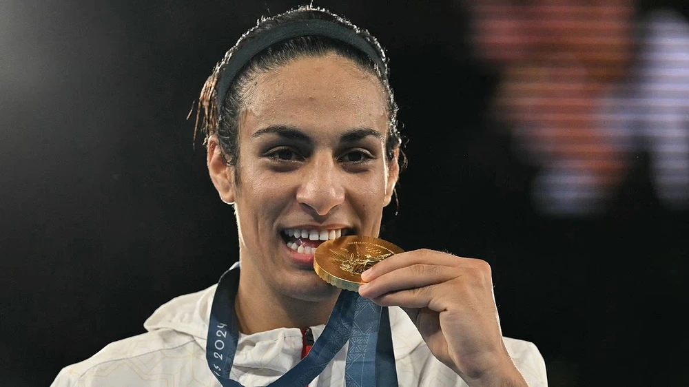 Nhà vô địch Olympic bị nghi ngờ là nam khoe diện mạo mới đầy nữ tính, hé lộ về tương lai - Ảnh 1.