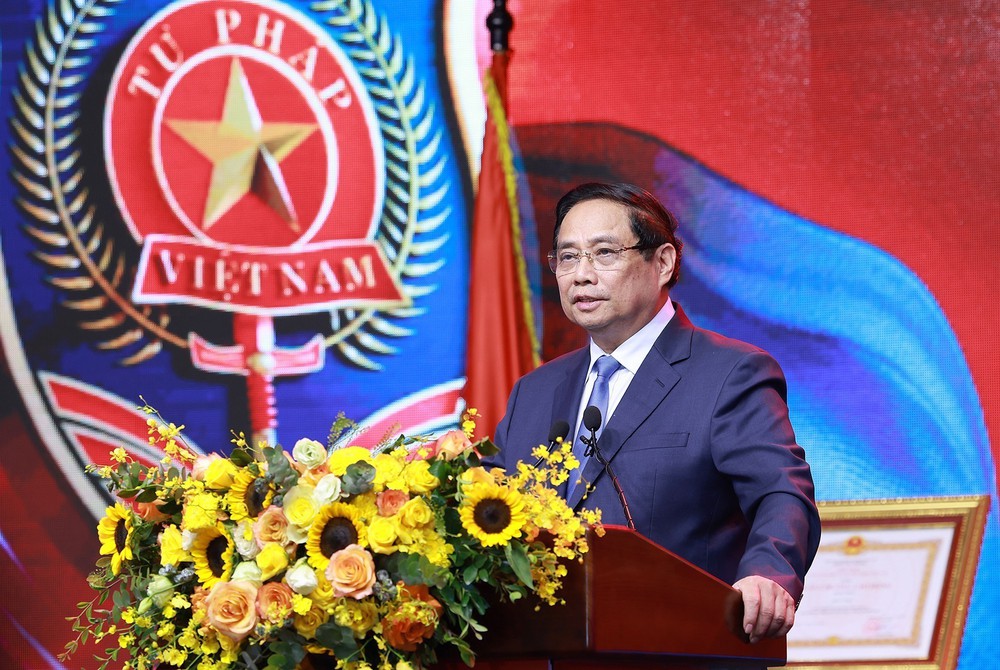 Thủ tướng Phạm Minh Chính: Bộ và ngành Tư pháp đưa công tác xây dựng và thi hành pháp luật thành lợi thế cạnh tranh quốc gia - Ảnh 3.