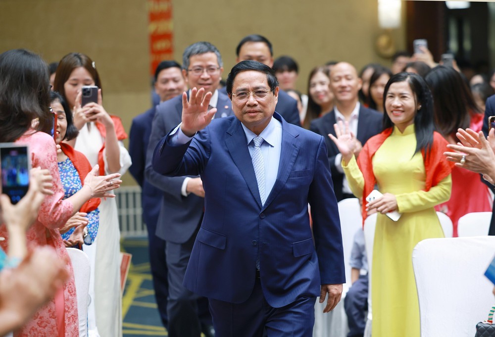 Thủ tướng Phạm Minh Chính gặp gỡ cộng đồng người Việt Nam tại Trung Quốc - Ảnh 1.