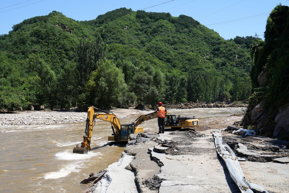 Trung Quốc nâng mức ứng phó khẩn cấp lũ lụt tại nhiều khu vực - Thủ đô Bắc Kinh sơ tán hơn 82.000 người - Ảnh 2.