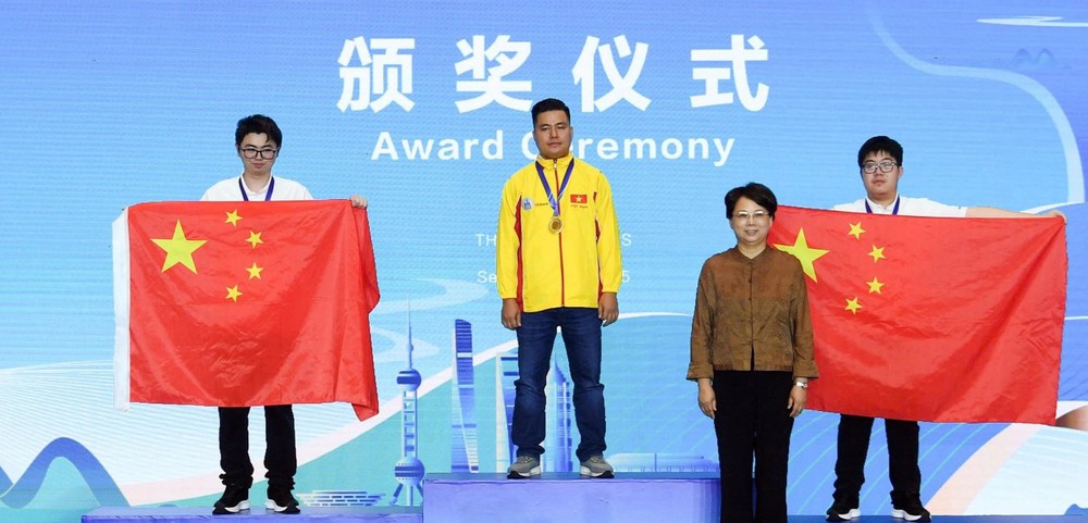 Kỳ thủ cờ tướng Việt Nam tiết lộ bí quyết giành chiến thắng ở Trung Quốc để vô địch thế giới - Ảnh 1.