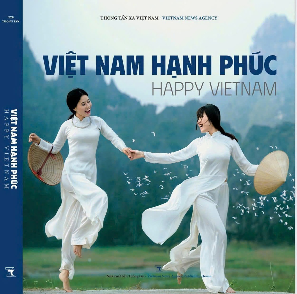 Nhà xuất bản Thông tấn ra mắt bộ 3 sách ảnh chào mừng Đại hội XIV của Đảng - Ảnh 1.