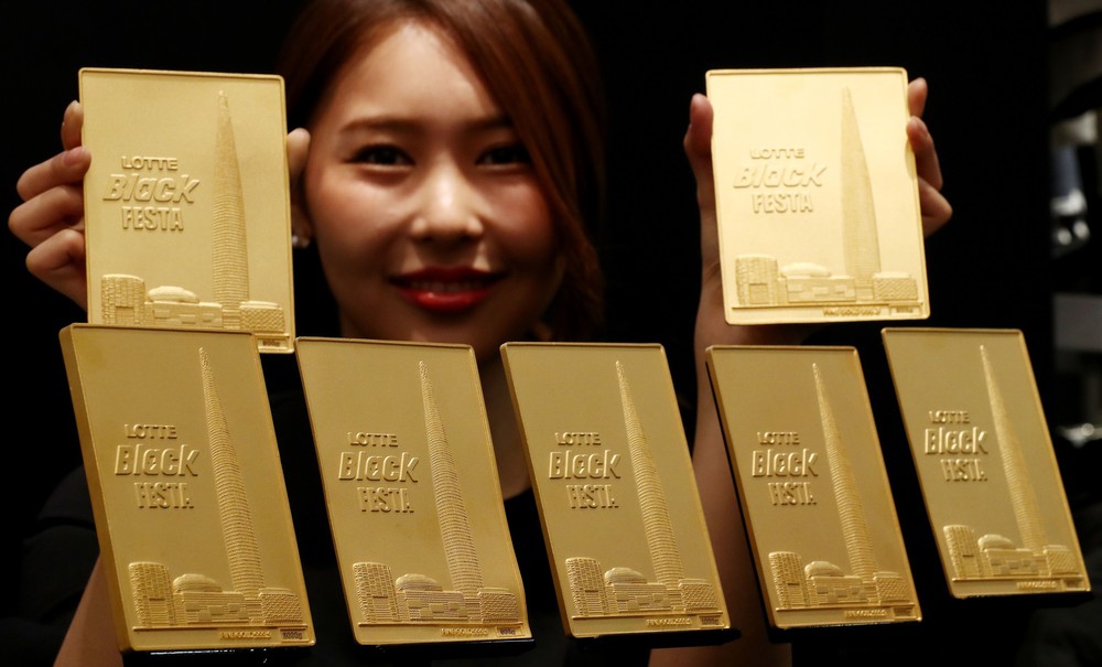 Giá vàng và bạc thế giới hạ nhiệt sau khi liên tiếp lập kỷ lục - Ảnh 1.