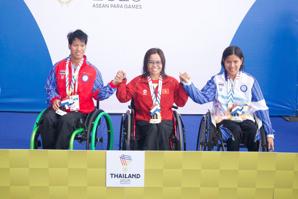 Kình ngư Vi Thị Hằng bỏ xa hai đối thủ Thái Lan, lập kỷ lục ASEAN Para Games thứ hai liên tiếp - Ảnh 2. Kình ngư Vi Thị Hằng bỏ xa hai đối thủ Thái Lan, lập kỷ lục ASEAN Para Games thứ hai liên tiếp - Ảnh 2.