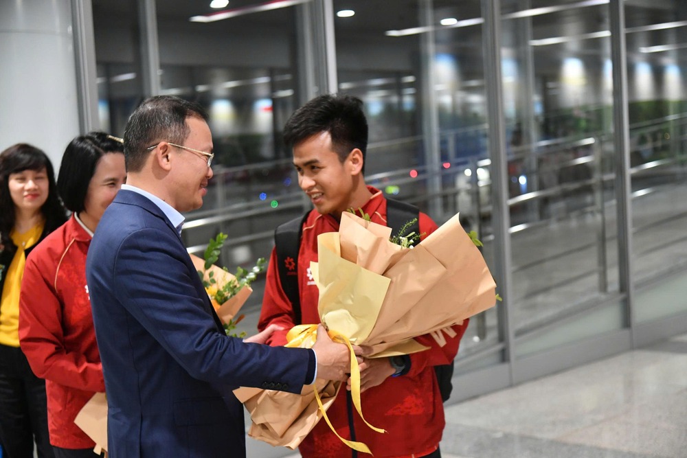 Đoàn Thể thao Người khuyết tật Việt Nam trở về nước, khép lại hành trình ASEAN Para Games 13 - Ảnh 2.