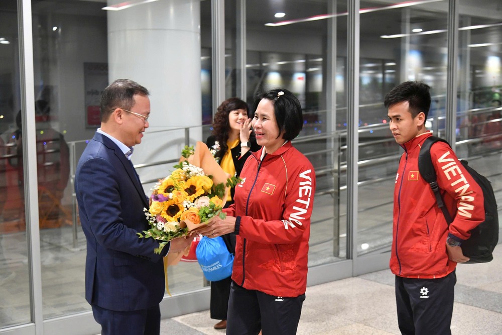 Đoàn Thể thao Người khuyết tật Việt Nam trở về nước, khép lại hành trình ASEAN Para Games 13 - Ảnh 3.