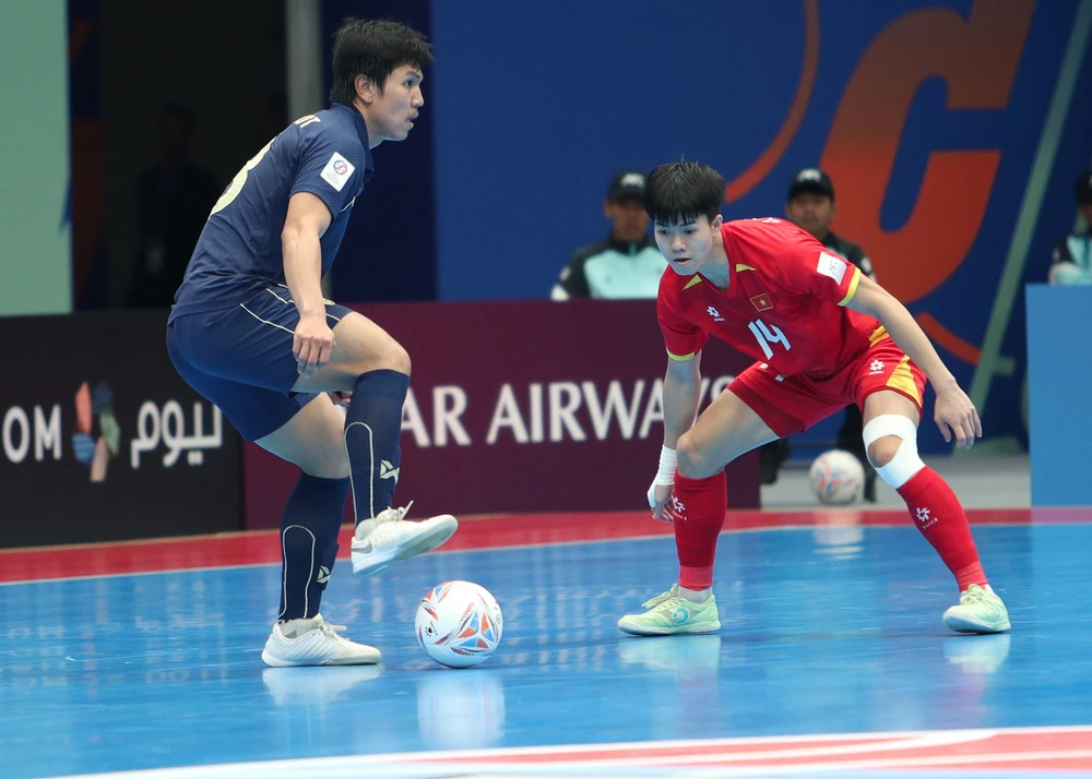 Nhận thất bại đáng tiếc trước Thái Lan, ĐT Việt Nam vẫn đi tiếp ở vòng tứ kết futsal châu Á 2026 - Ảnh 7. Nhận thất bại đáng tiếc trước Thái Lan, ĐT Việt Nam vẫn đi tiếp ở vòng tứ kết futsal châu Á 2026 - Ảnh 7.