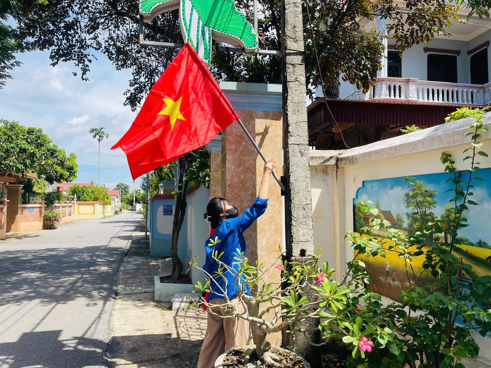 Điểm nhấn cho diện mạo nông thôn mới từ mô hình “Đường cờ Tổ quốc” - Ảnh 3. Điểm nhấn cho diện mạo nông thôn mới từ mô hình “Đường cờ Tổ quốc” - Ảnh 3.