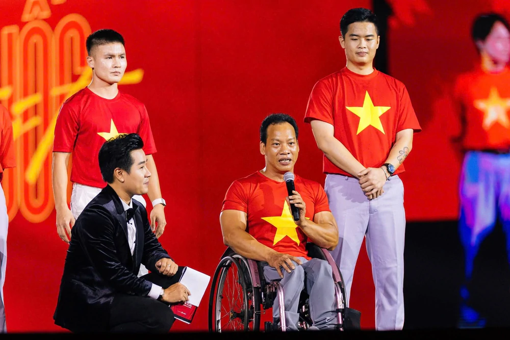 Chân dung người cầm cờ Đoàn thể thao người khuyết tật Việt Nam tại Asian Para Games 2026 - Ảnh 3. Chân dung người cầm cờ Đoàn thể thao người khuyết tật Việt Nam tại Asian Para Games 2026 - Ảnh 3.
