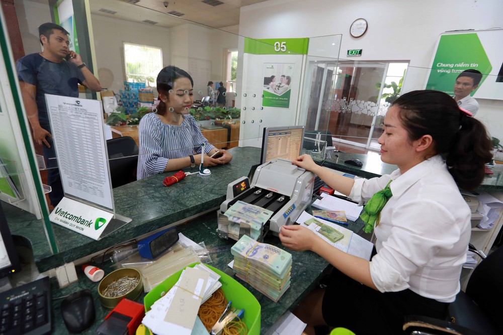 Gần 20 ngân hàng công bố giảm lãi suất, có nơi giảm đến 3%/năm - Ảnh 2.