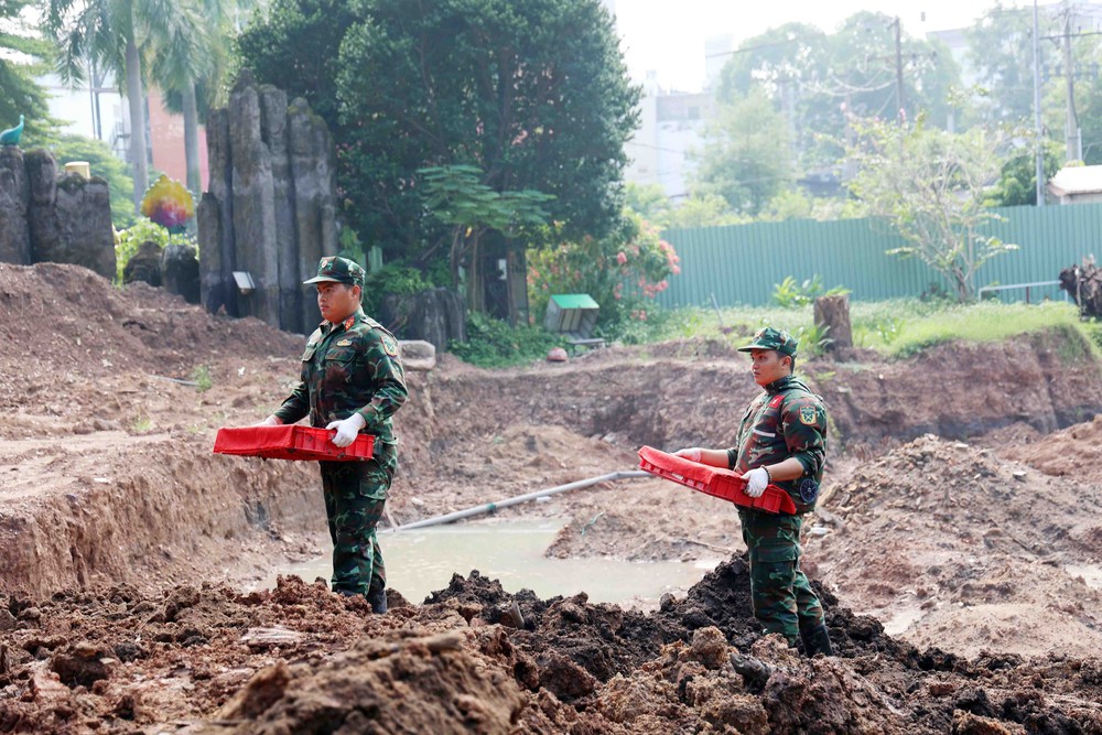 Tiếp tục triển khai công tác tìm kiếm, quy tập hài cốt liệt sĩ tại công viên Lê Thị Riêng - Ảnh 9. Tiếp tục triển khai công tác tìm kiếm, quy tập hài cốt liệt sĩ tại công viên Lê Thị Riêng - Ảnh 9.