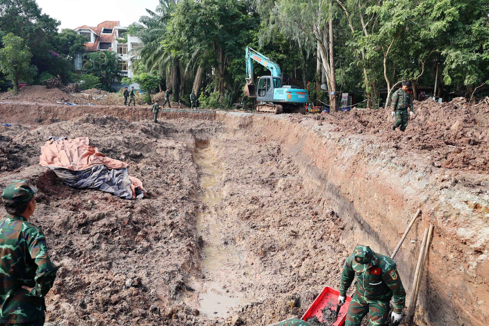 Tiếp tục triển khai công tác tìm kiếm, quy tập hài cốt liệt sĩ tại công viên Lê Thị Riêng - Ảnh 4. Tiếp tục triển khai công tác tìm kiếm, quy tập hài cốt liệt sĩ tại công viên Lê Thị Riêng - Ảnh 4.