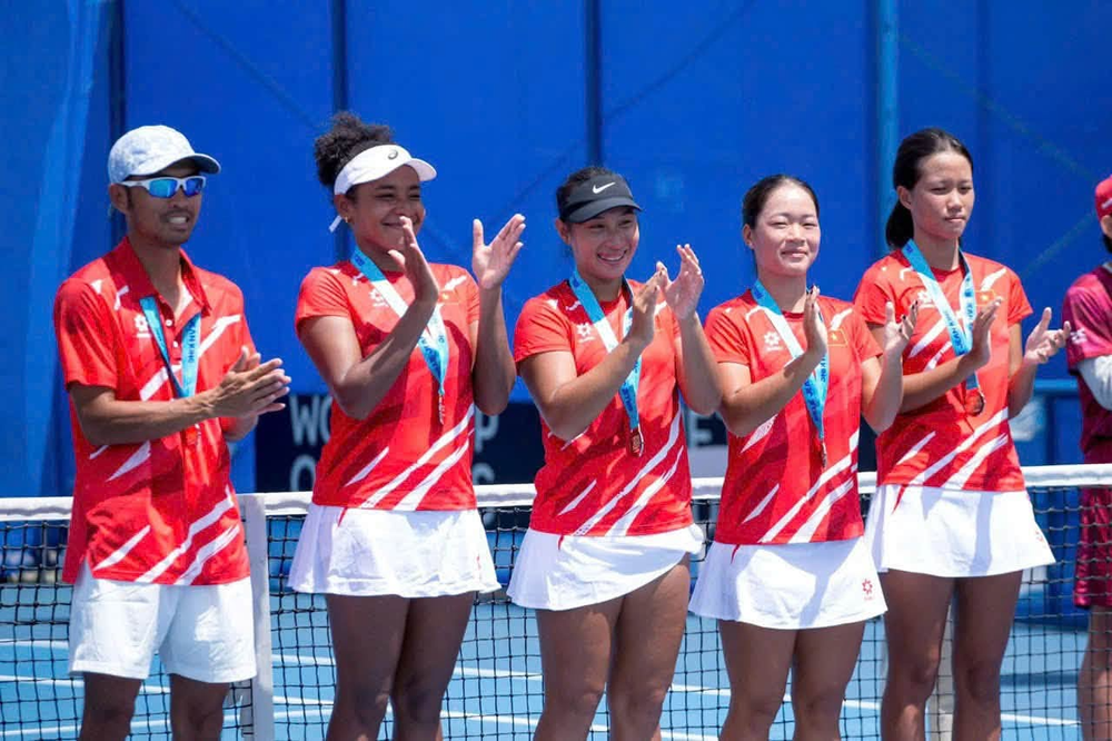 Quần vợt nữ Việt Nam lập cột mốc lịch sử, lần đầu thăng hạng Billie Jean King Cup Nhóm II - Ảnh 1.