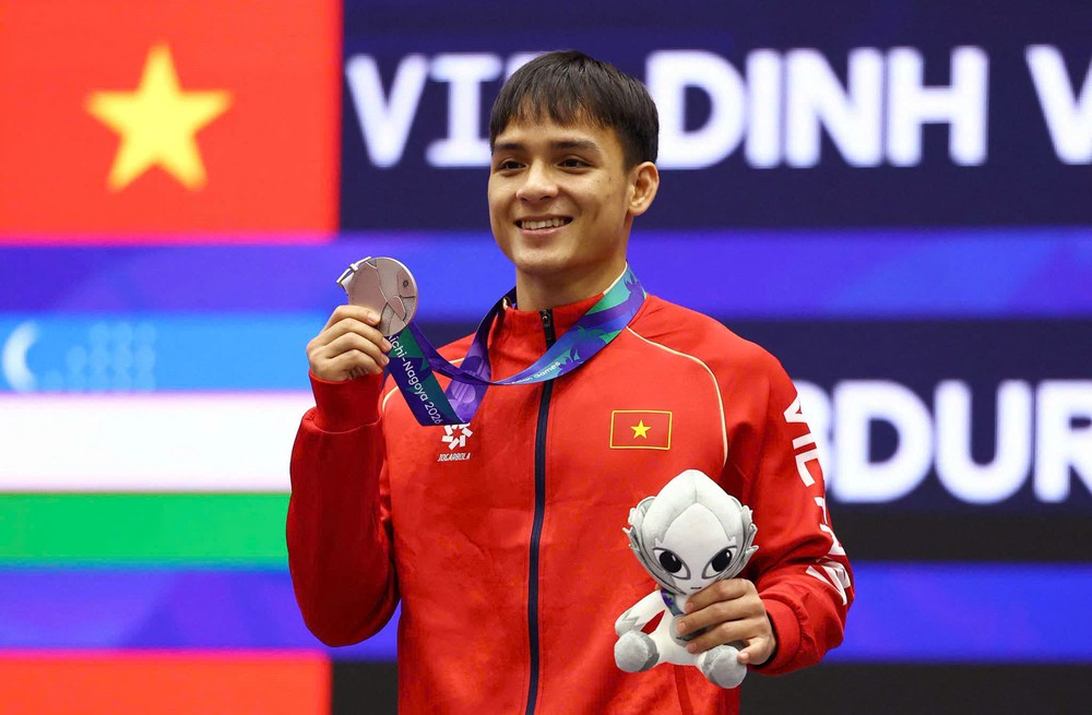 Thanh niên Sống đẹp 2026: Từ cậu bé người Hrê đến tấm huy chương Bạc tại ASIAD - Ảnh 1. Thanh niên Sống đẹp 2026: Từ cậu bé người Hrê đến tấm huy chương Bạc tại ASIAD - Ảnh 1.