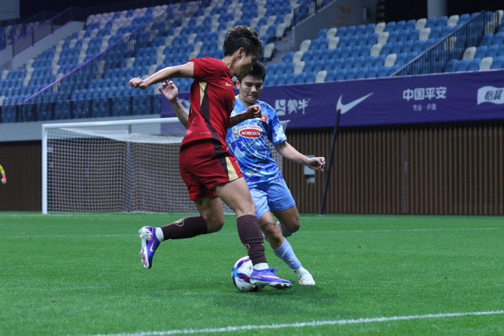 HLV Mai Đức Chung hài lòng về đội tuyển nữ Việt Nam - Ảnh 1.