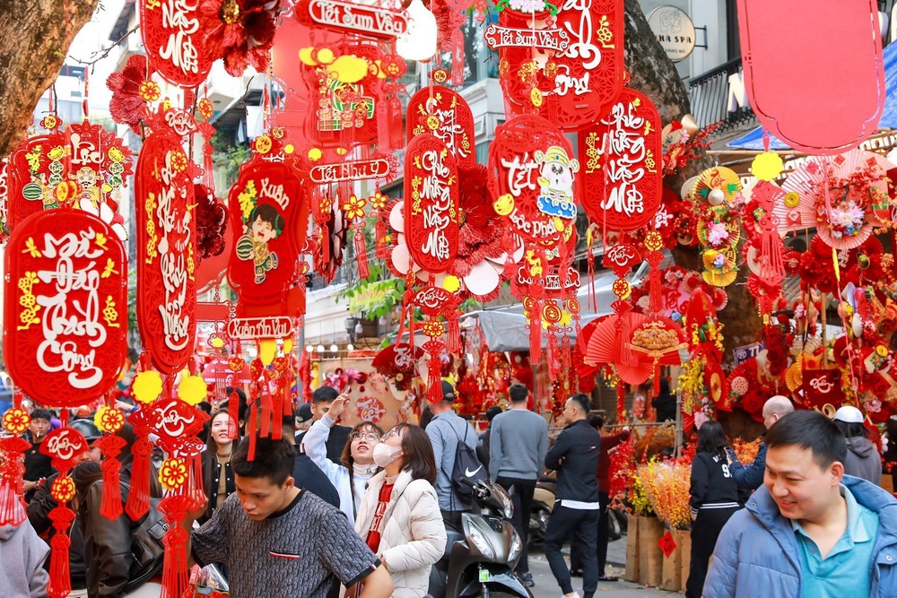 Rực rỡ sắc Xuân giữa lòng phố cổ - Ảnh 15.