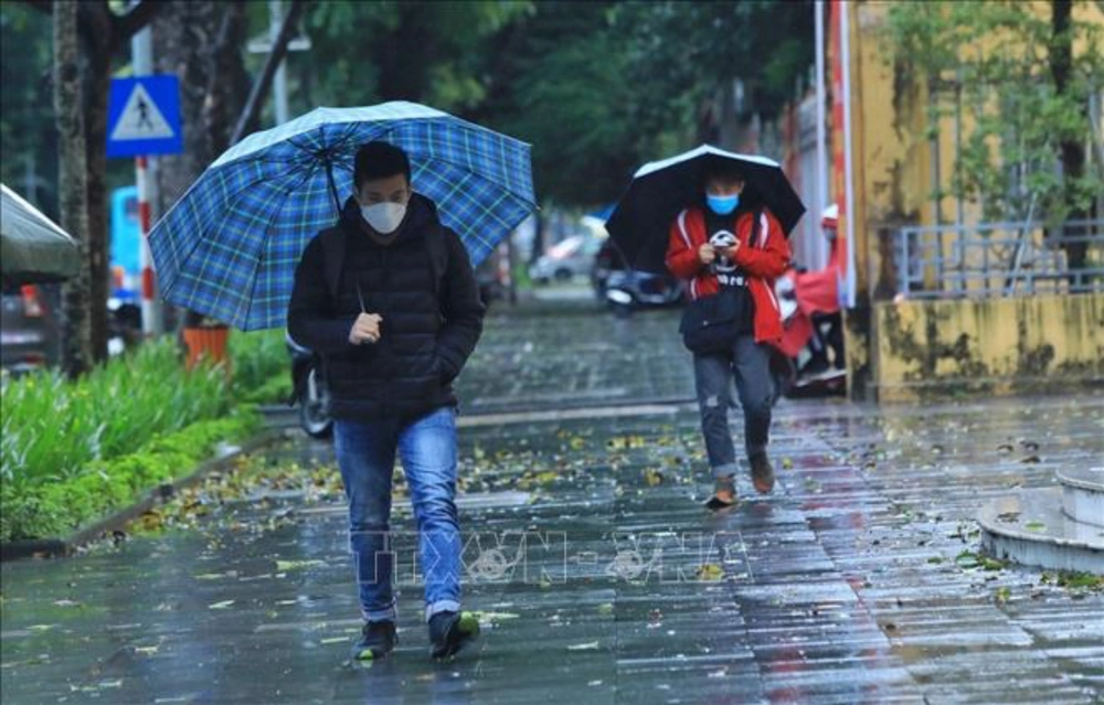 Thời tiết ngày mùng 1 Tết: Miền Bắc chuyển mưa rét, Nam Bộ nắng nóng - Ảnh 1. Thời tiết ngày mùng 1 Tết: Miền Bắc chuyển mưa rét, Nam Bộ nắng nóng - Ảnh 1.