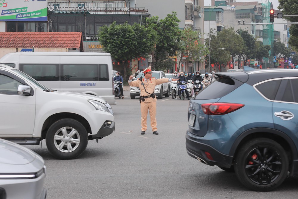Giao thông Hà Nội thuận lợi trong ngày đầu làm việc sau nghỉ Tết - Ảnh 6. Giao thông Hà Nội thuận lợi trong ngày đầu làm việc sau nghỉ Tết - Ảnh 6.