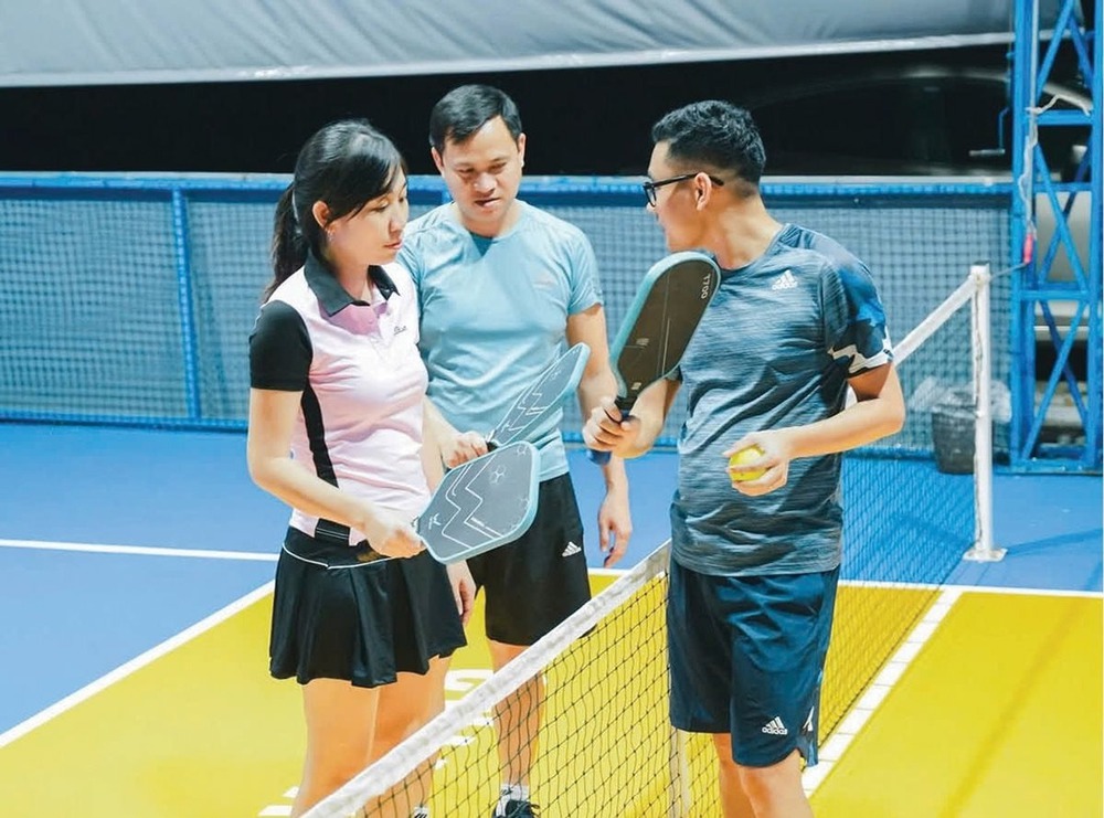 Làn sóng huấn luyện viên tennis, cầu lông đổ xô sang pickleball - Ảnh 1. Làn sóng huấn luyện viên tennis, cầu lông đổ xô sang pickleball - Ảnh 1.