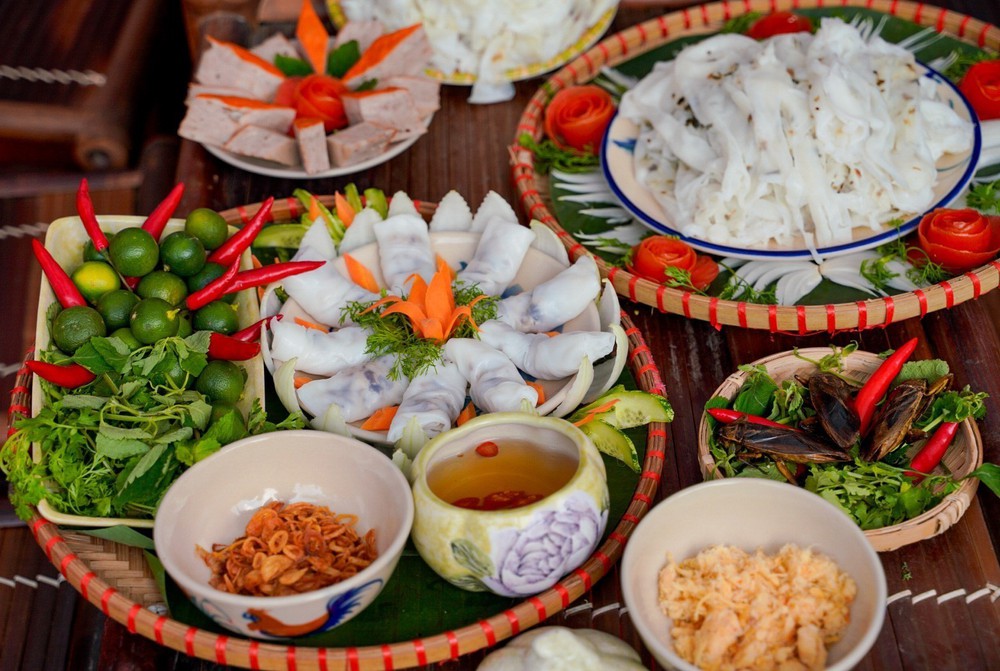 Nghề làm bánh cuốn Thanh Trì được ghi danh Di sản văn hóa phi vật thể quốc gia  - Ảnh 10.