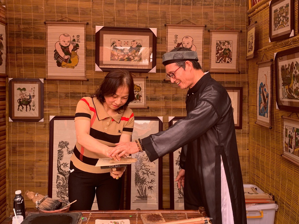 Tái hiện chợ tranh Đông Hồ truyền thống một thời - Ảnh 4. Tái hiện chợ tranh Đông Hồ truyền thống một thời - Ảnh 4.