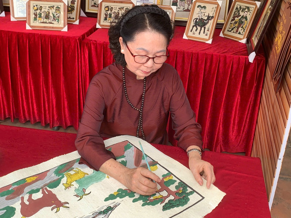 Tái hiện chợ tranh Đông Hồ truyền thống một thời - Ảnh 3. Tái hiện chợ tranh Đông Hồ truyền thống một thời - Ảnh 3.