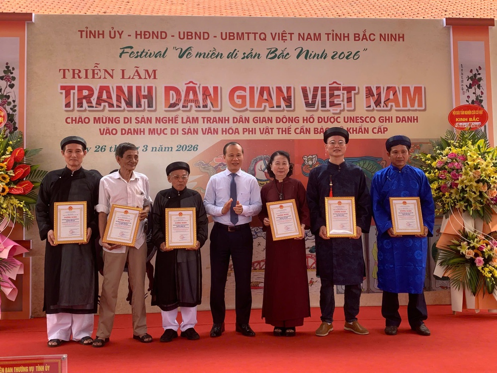 Tái hiện chợ tranh Đông Hồ truyền thống một thời - Ảnh 5. Tái hiện chợ tranh Đông Hồ truyền thống một thời - Ảnh 5.