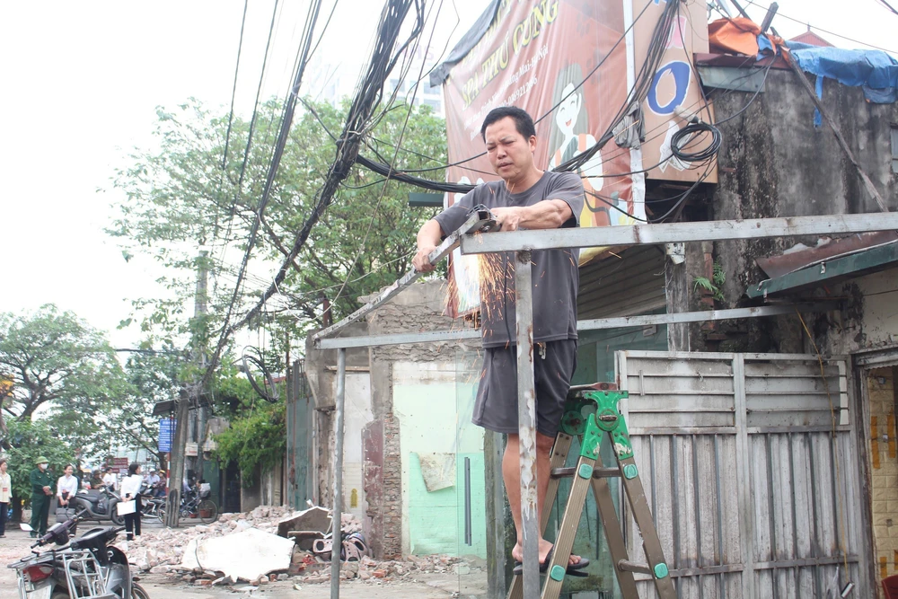 Hà Nội: Cưỡng chế thu hồi đất thực hiện dự án xây dựng đường Tam Trinh - Ảnh 11. Hà Nội: Cưỡng chế thu hồi đất thực hiện dự án xây dựng đường Tam Trinh - Ảnh 11.