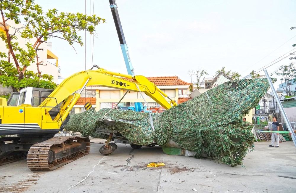Cà Mau: Di dời để bảo tồn chiếc máy bay tiêm kích MiG-21 sau bốn thập kỷ bị "bỏ quên" - Ảnh 2.