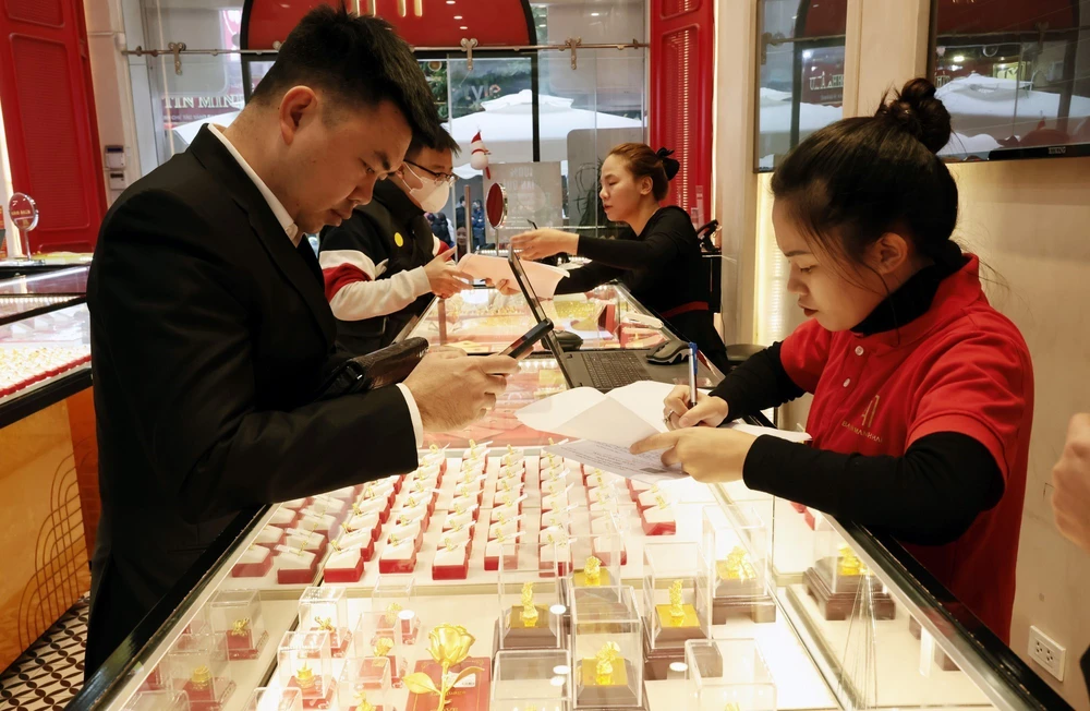 Giá vàng sáng 30/3 giảm 1,4 triệu đồng/lượng - Ảnh 1.