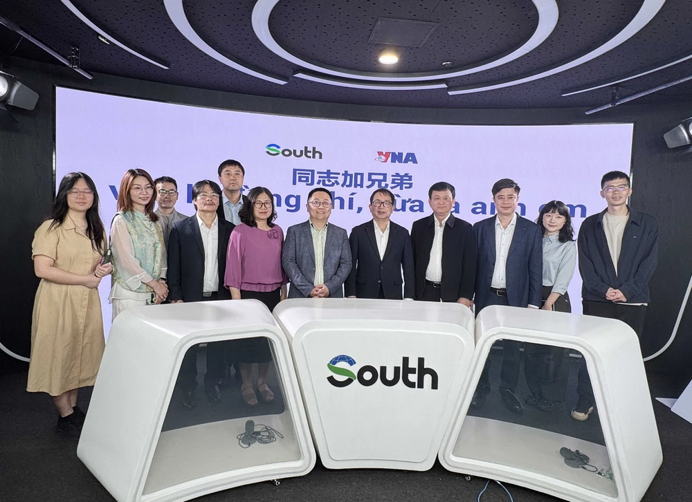 TTXVN và Tân Hoa xã tăng cường hợp tác về chuyển đổi số và ứng dụng công nghệ - Ảnh 4.