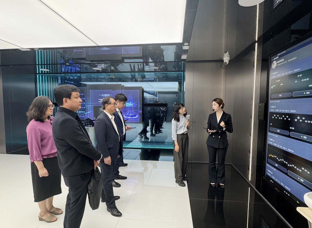 TTXVN và Tân Hoa xã tăng cường hợp tác về chuyển đổi số và ứng dụng công nghệ - Ảnh 9.