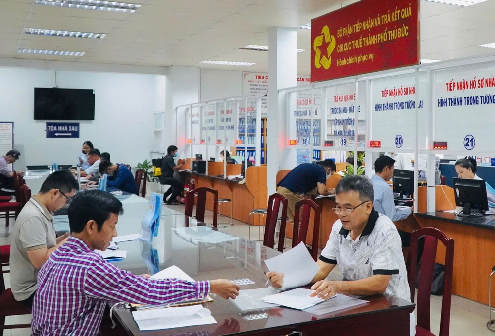 Nâng ngưỡng chịu thuế với hộ kinh doanh lên 1 tỷ đồng/năm, áp dụng từ 1/1/2026 - Ảnh 2.