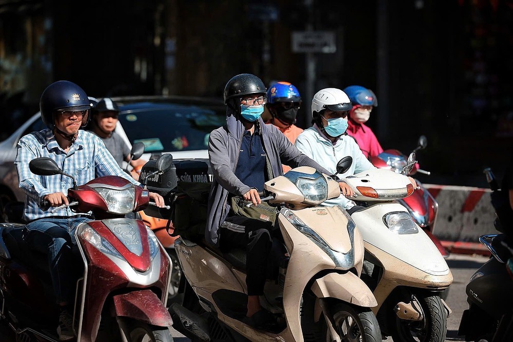 Người dân Thủ đô chủ động ứng phó với đợt nắng nóng gay gắt - Ảnh 4. Người dân Thủ đô chủ động ứng phó với đợt nắng nóng gay gắt - Ảnh 4.