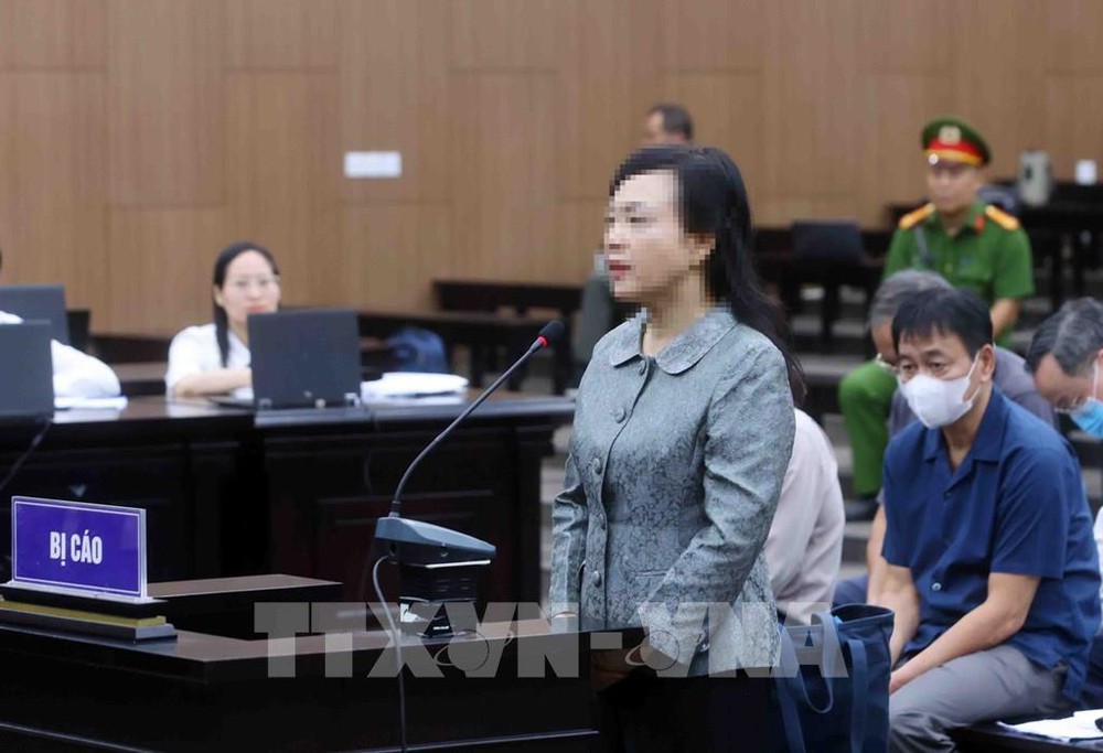 Cựu Bộ trưởng Bộ Y tế Nguyễn Thị Kim Tiến bị tuyên phạt 6 năm tù - Ảnh 1. Cựu Bộ trưởng Bộ Y tế Nguyễn Thị Kim Tiến bị tuyên phạt 6 năm tù - Ảnh 1.