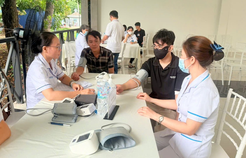 Thành phố Hồ Chí Minh phát động chương trình khám sức khỏe cho 1 triệu người lao động - Ảnh 2.