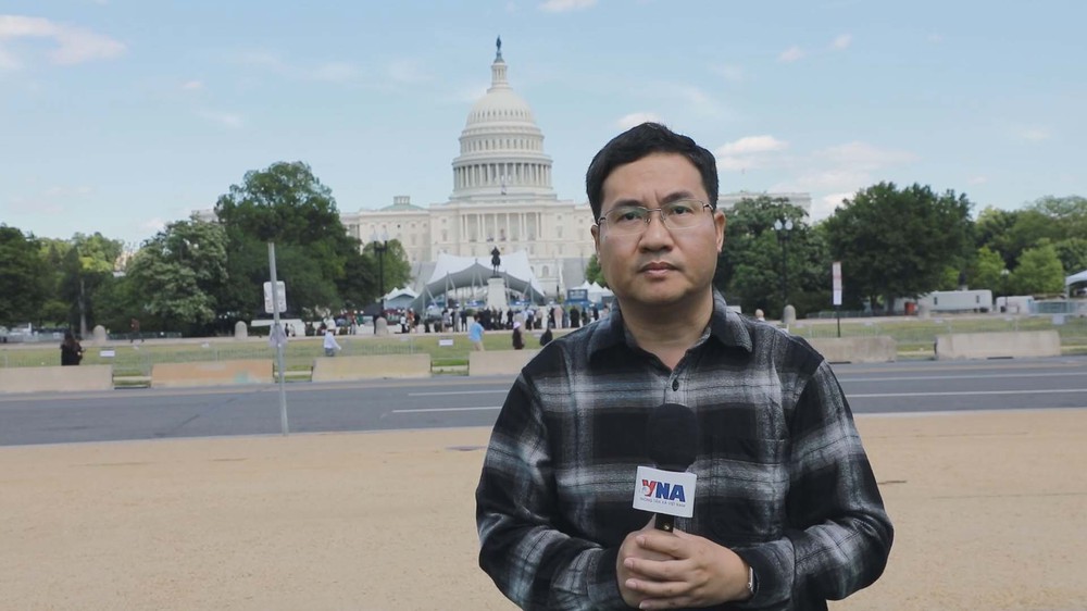 Nhà báo Đoàn Mạnh Hùng, phóng viên TTXVN tại Washington: Quan trọng nhất vẫn là sự hiện diện của phóng viên tại hiện trường - Ảnh 1. Nhà báo Đoàn Mạnh Hùng, phóng viên TTXVN tại Washington: Quan trọng nhất vẫn là sự hiện diện của phóng viên tại hiện trường - Ảnh 1.