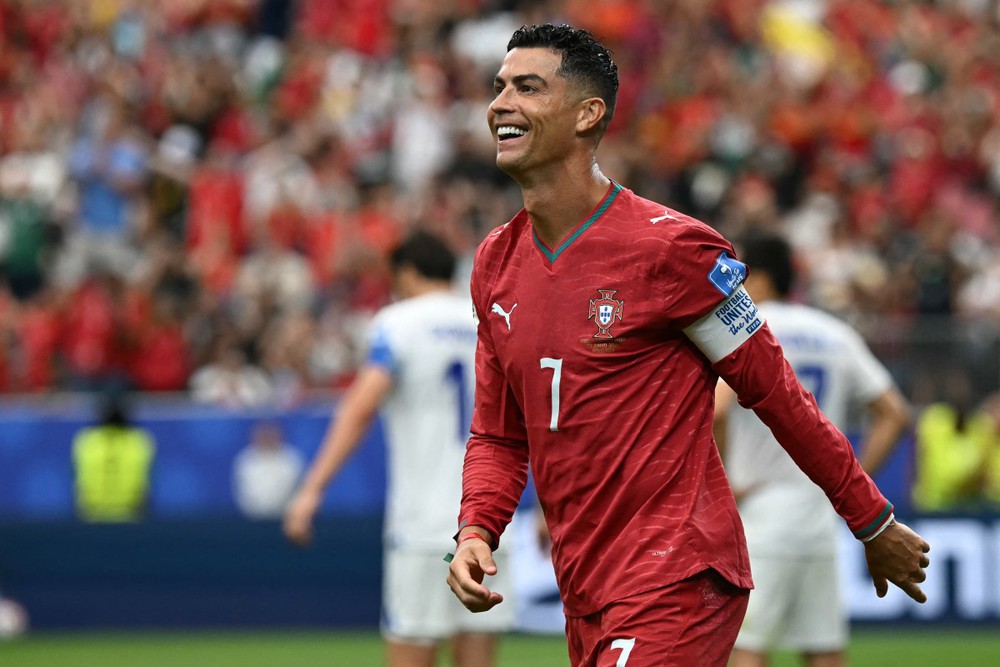 Nụ cười chiến thắng của Ronaldo. Ảnh: AFP/TTXVN