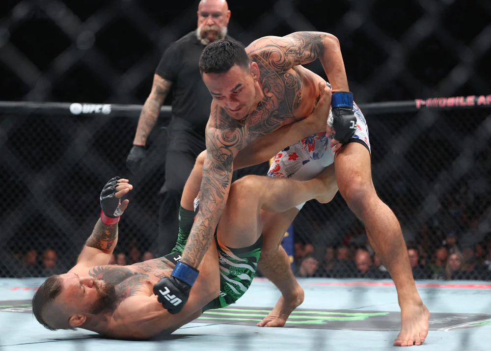 McGregor tái xuất thảm họa: Thua chỉ sau hơn 1 phút thi đấu - Ảnh 4.